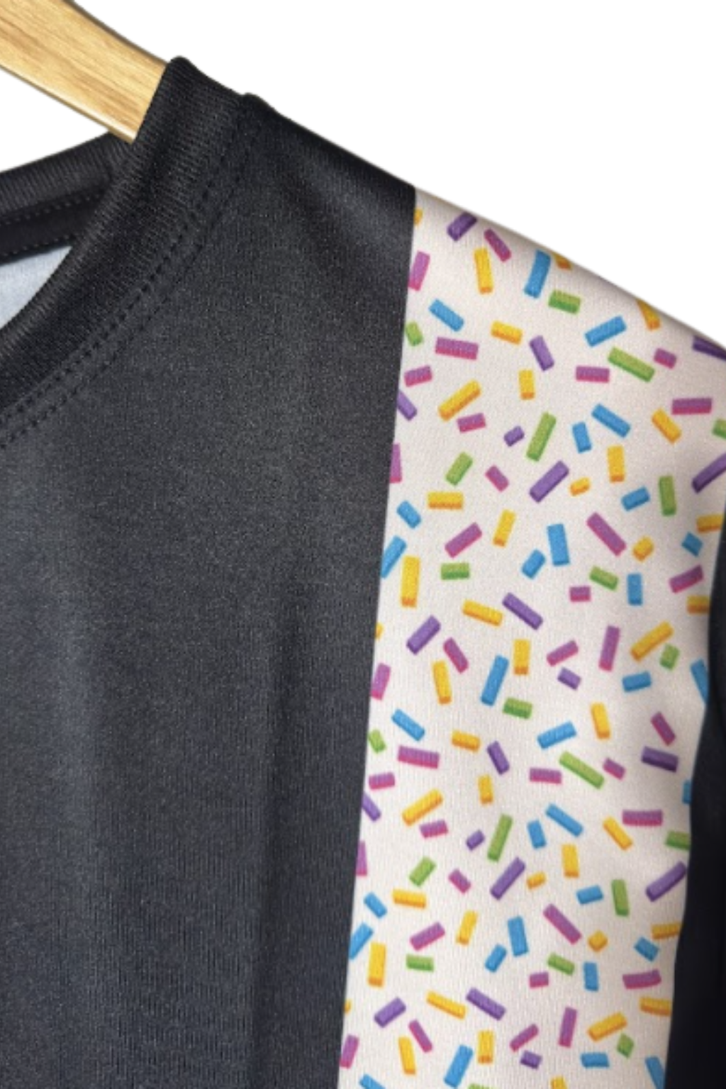 Polera Vainilla Arcoíris Negra